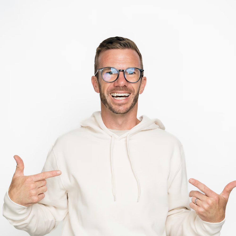 Hayden Judd smiling in a white hoodie