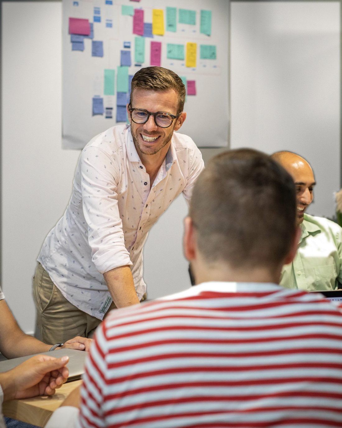 Hayden Judd running a workshop at a whiteboard